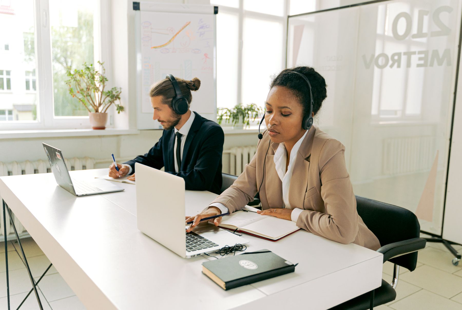 Customer service professionals working in an office