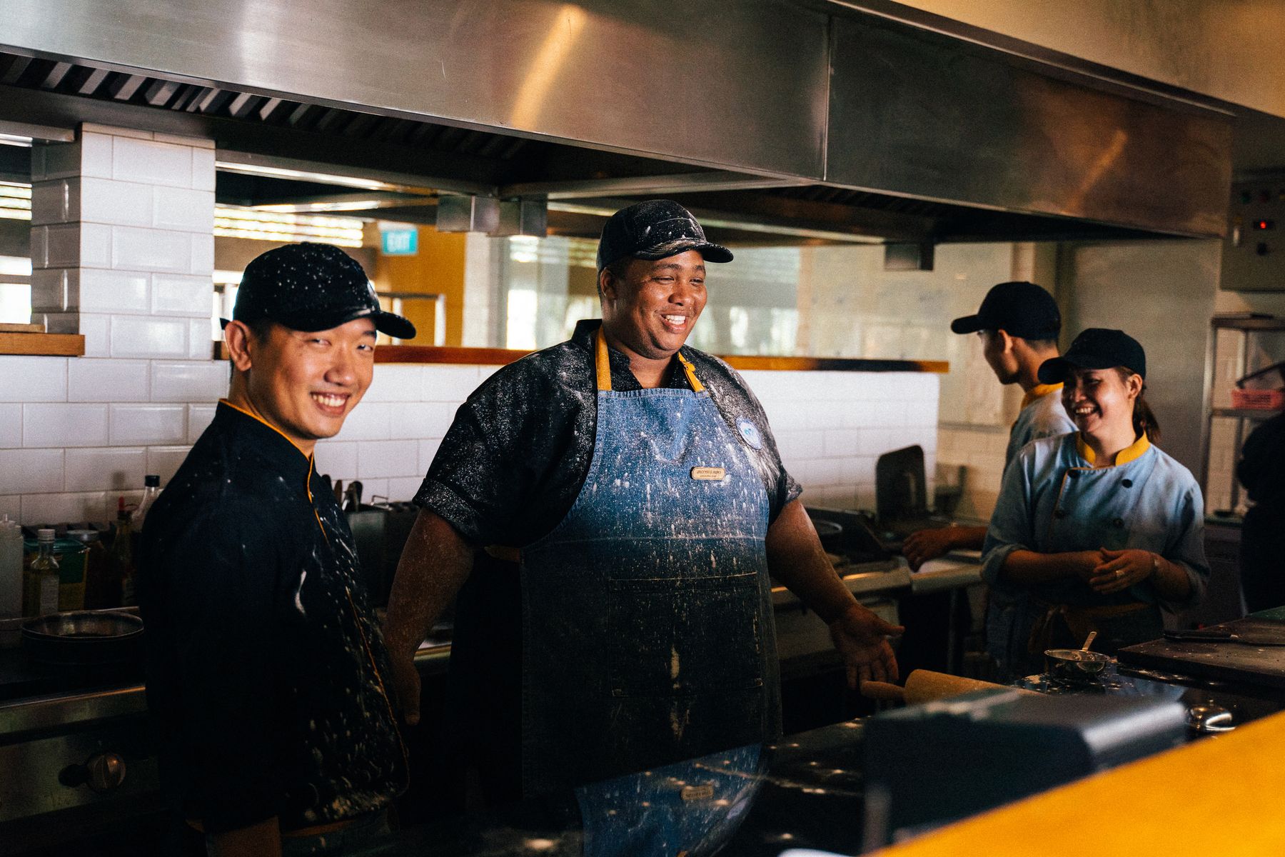 A restaurant kitchen team working together